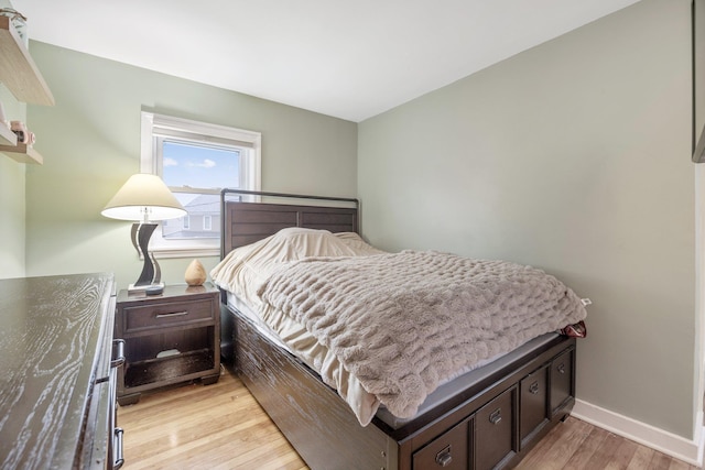 bedroom with light hardwood / wood-style floors