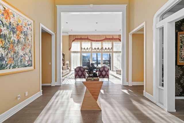 corridor featuring hardwood / wood-style floors