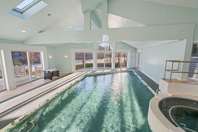 view of pool with a skylight