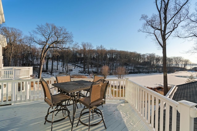 view of snow covered deck