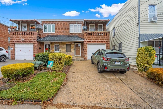 view of front of home with cooling unit and a garage