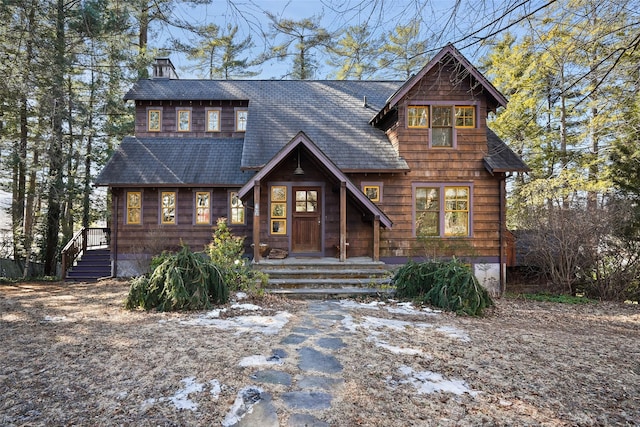 view of front of property featuring a chimney