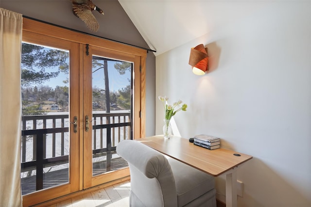 office space featuring french doors and vaulted ceiling