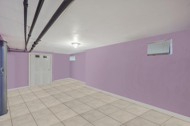 basement with light tile patterned floors