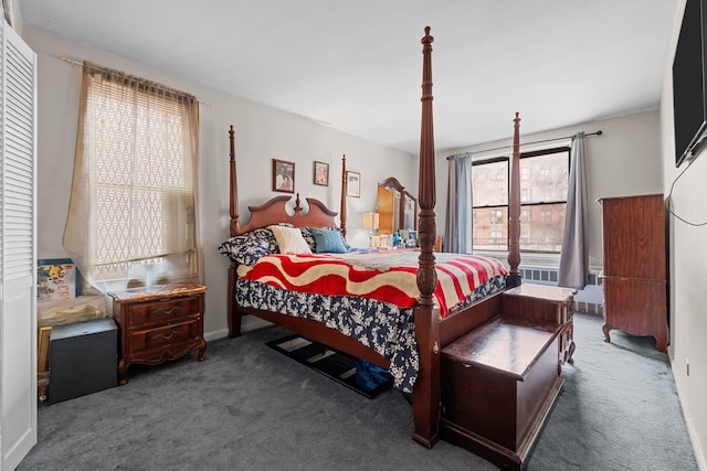 bedroom featuring dark carpet