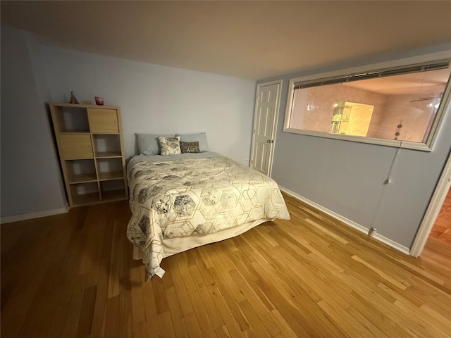 bedroom featuring hardwood / wood-style floors