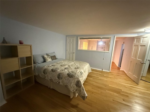 bedroom with light hardwood / wood-style floors