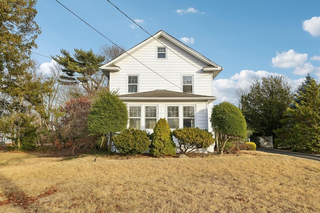 view of property exterior featuring a yard