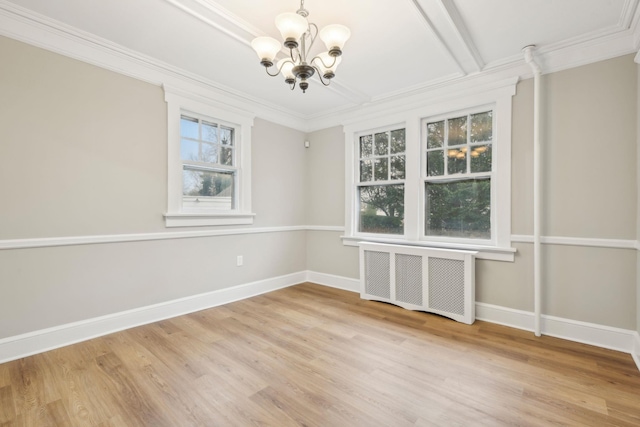 empty room featuring radiator, crown molding, beamed ceiling, wood-type flooring, and a chandelier