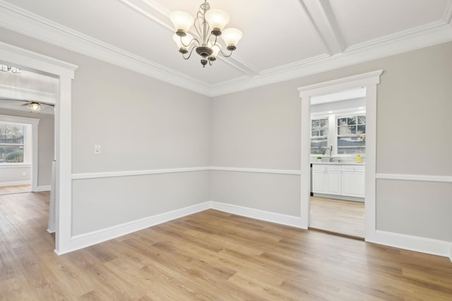 spare room featuring ornamental molding, ceiling fan with notable chandelier, sink, beam ceiling, and light hardwood / wood-style floors