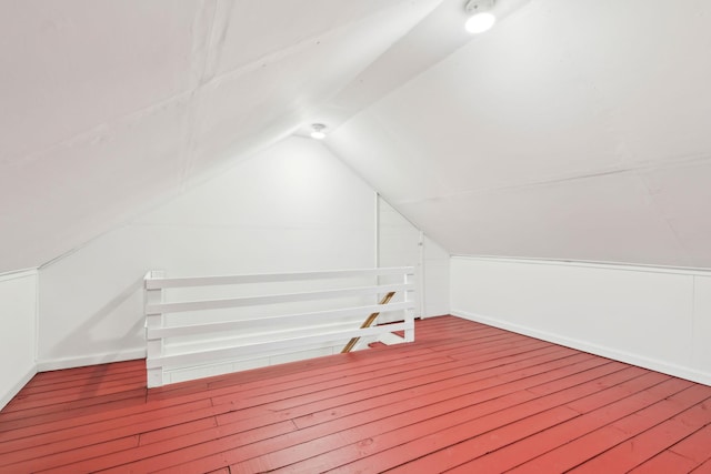 bonus room with vaulted ceiling