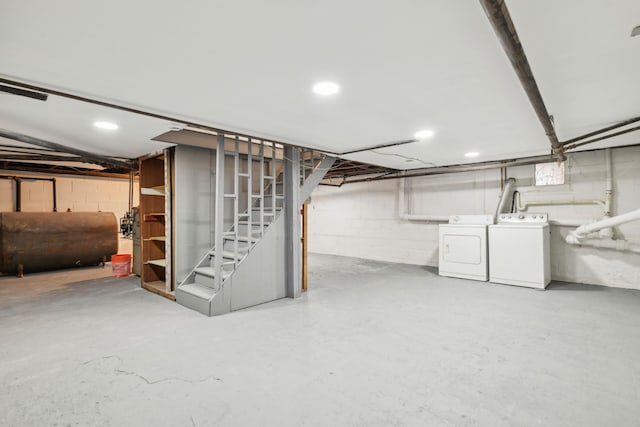 basement with washing machine and dryer