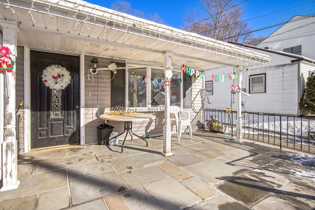 doorway to property with a porch