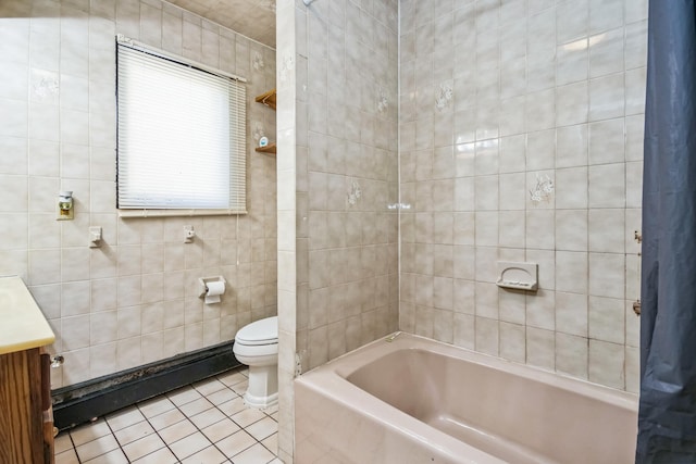 full bathroom with tile patterned flooring, vanity, tile walls, and toilet