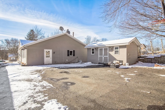 view of snow covered property