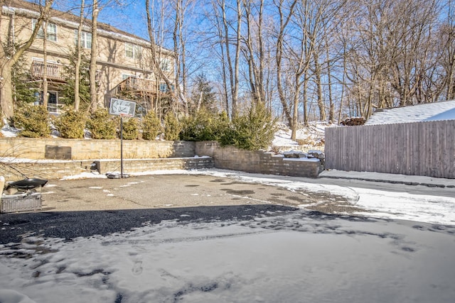 view of yard covered in snow