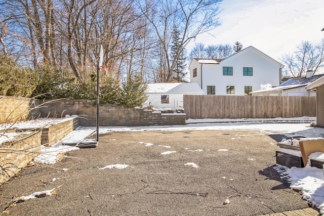 view of yard covered in snow