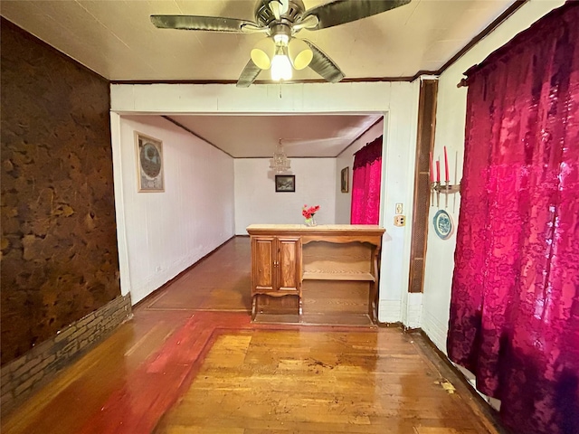 corridor featuring hardwood / wood-style floors