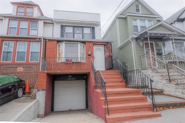 multi unit property featuring a garage