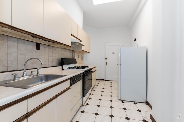 kitchen featuring white cabinets, white appliances, backsplash, and sink