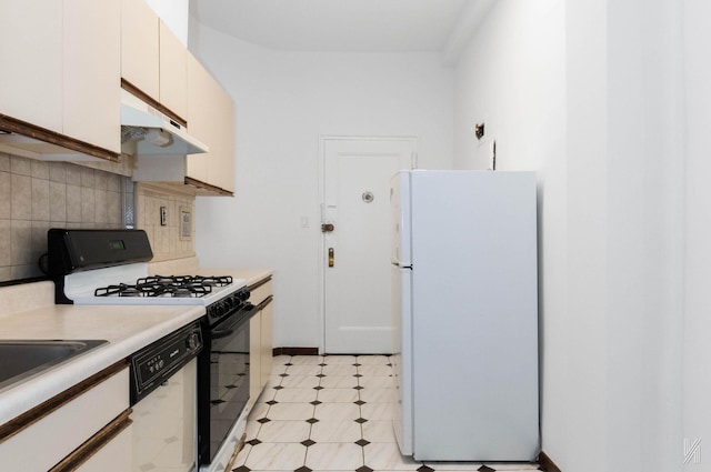 kitchen featuring white cabinets, white appliances, and backsplash