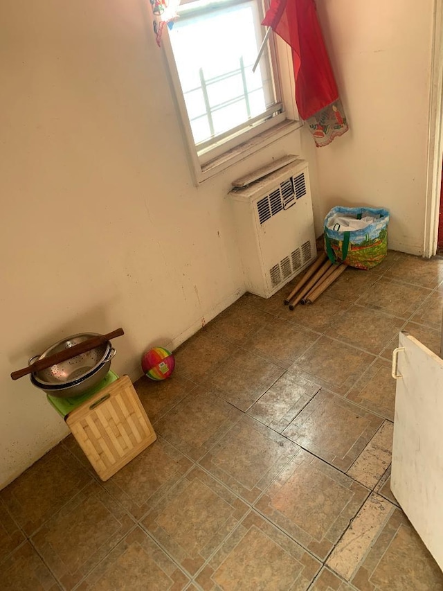 bathroom featuring radiator