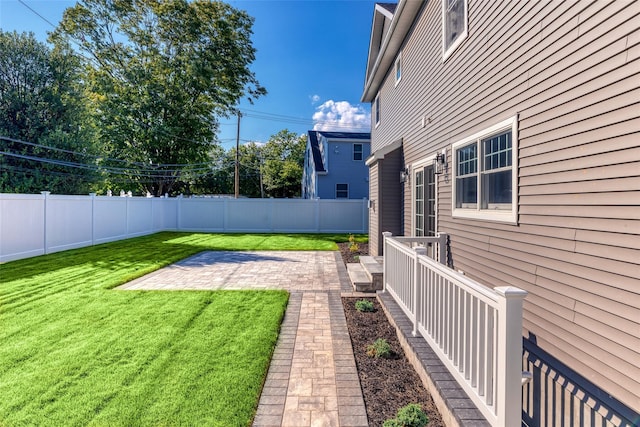 view of yard with a patio area