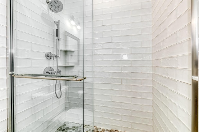 bathroom featuring walk in shower