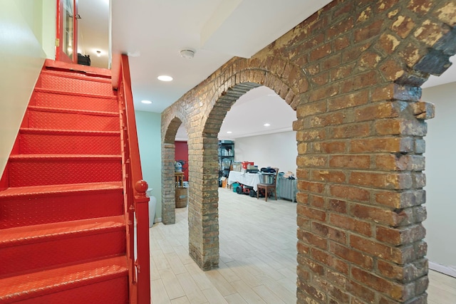 stairs featuring wood-type flooring