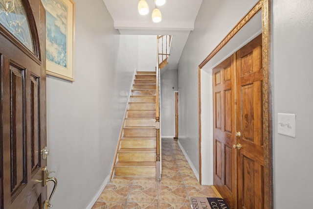 entrance foyer with beam ceiling