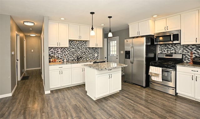 8 Maple Dr, Warwick, NY 10990 - kitchen featuring stainless steel appliances, tasteful backsplash, white cabinets, and recessed lighting