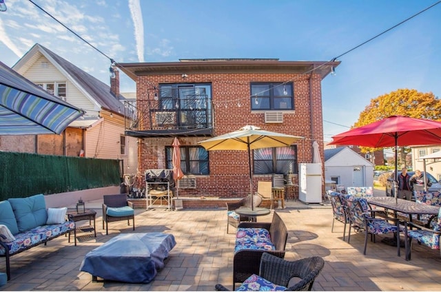 back of house featuring a patio