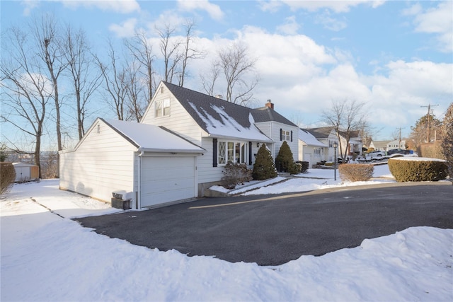 exterior space with a garage