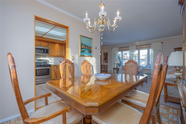 dining room with crown molding and an inviting chandelier