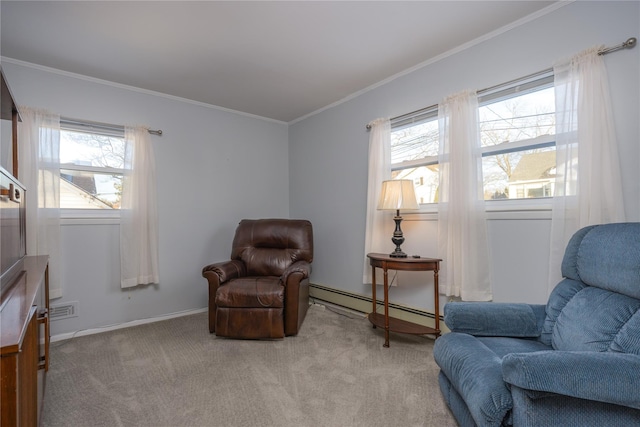 sitting room with a baseboard heating unit, ornamental molding, and light colored carpet