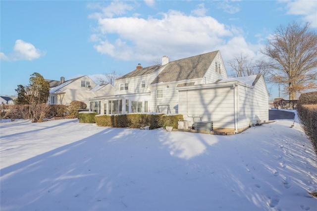 view of snow covered property