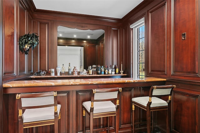 bar featuring wooden walls