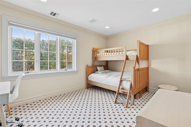 bedroom featuring crown molding