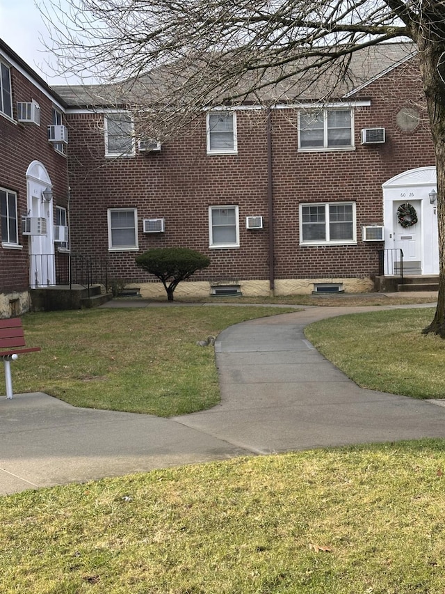 surrounding community featuring a yard