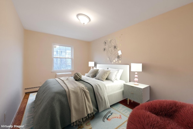 bedroom with a baseboard radiator and light wood-type flooring