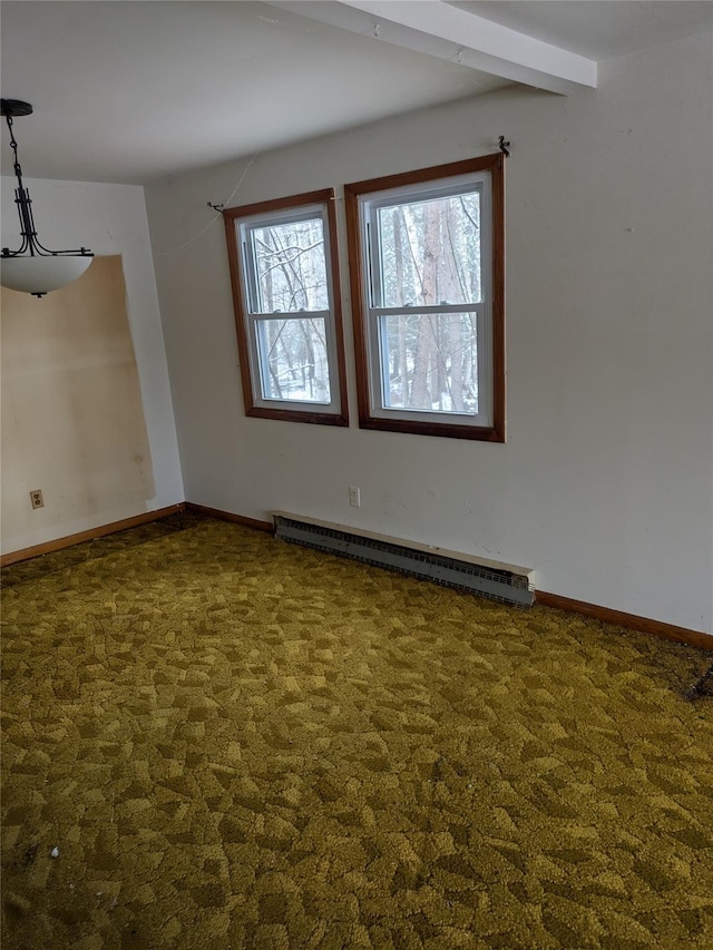 carpeted spare room featuring beamed ceiling and a baseboard heating unit