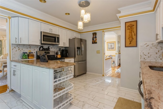 kitchen with backsplash, stainless steel appliances, white cabinetry, and hanging light fixtures