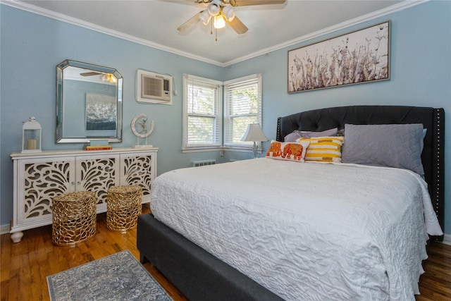 bedroom with a wall mounted air conditioner, ceiling fan, dark hardwood / wood-style floors, and ornamental molding