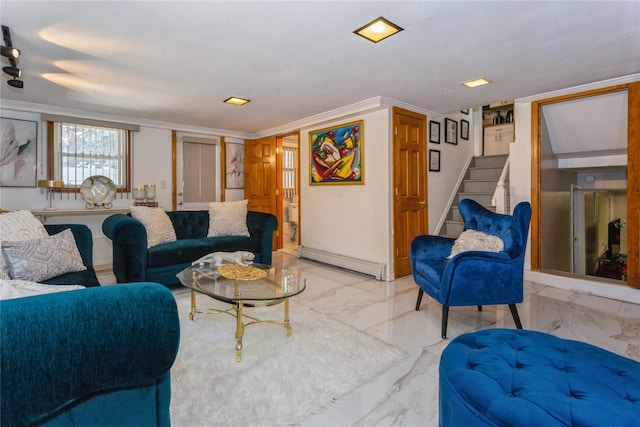 living room featuring baseboard heating and crown molding