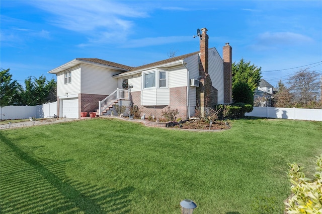 exterior space with a yard and a garage