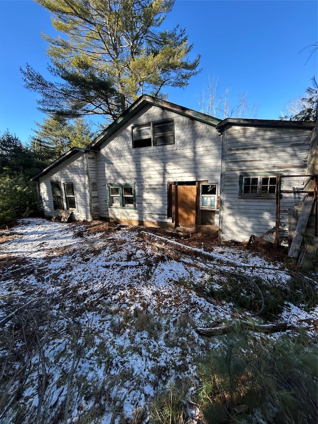 view of snow covered property