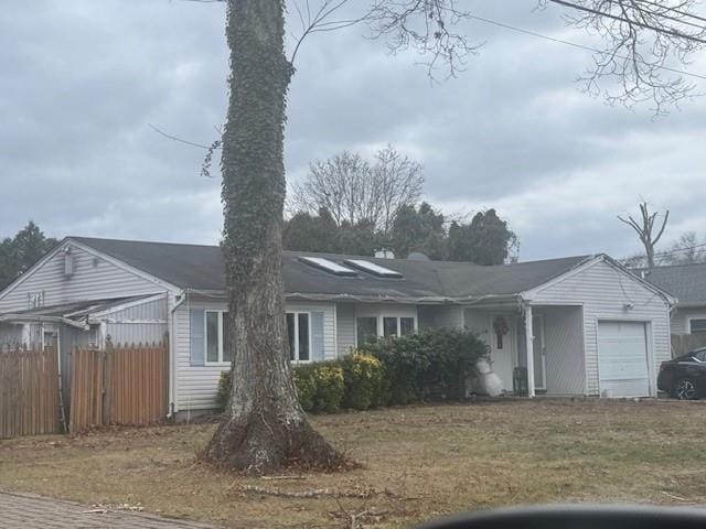 view of front of home with a garage