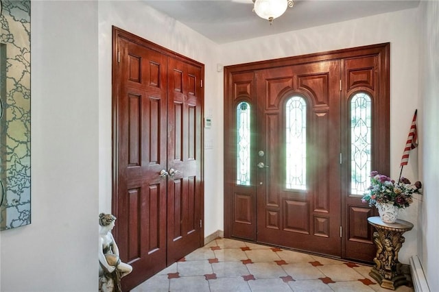 entrance foyer with a baseboard radiator