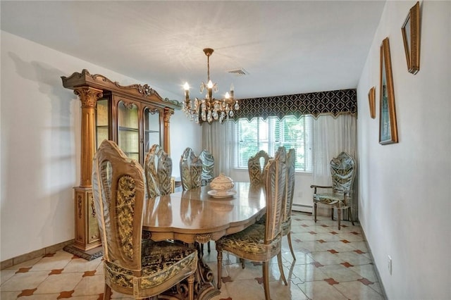 dining room with a baseboard heating unit and a notable chandelier