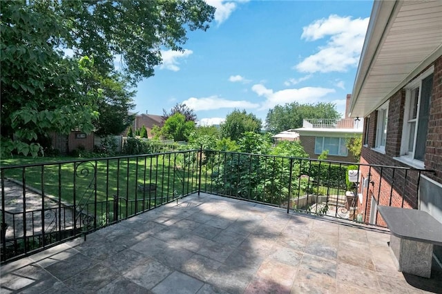 view of patio / terrace with a balcony